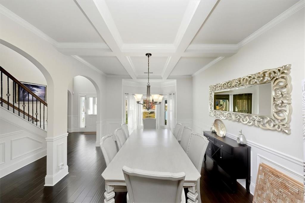 4058 Rosebay Way Southwest Conyers, GA 30094 - Photo 7 of 55 a living room with furniture and a chandelier