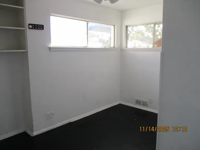 an empty room with a window