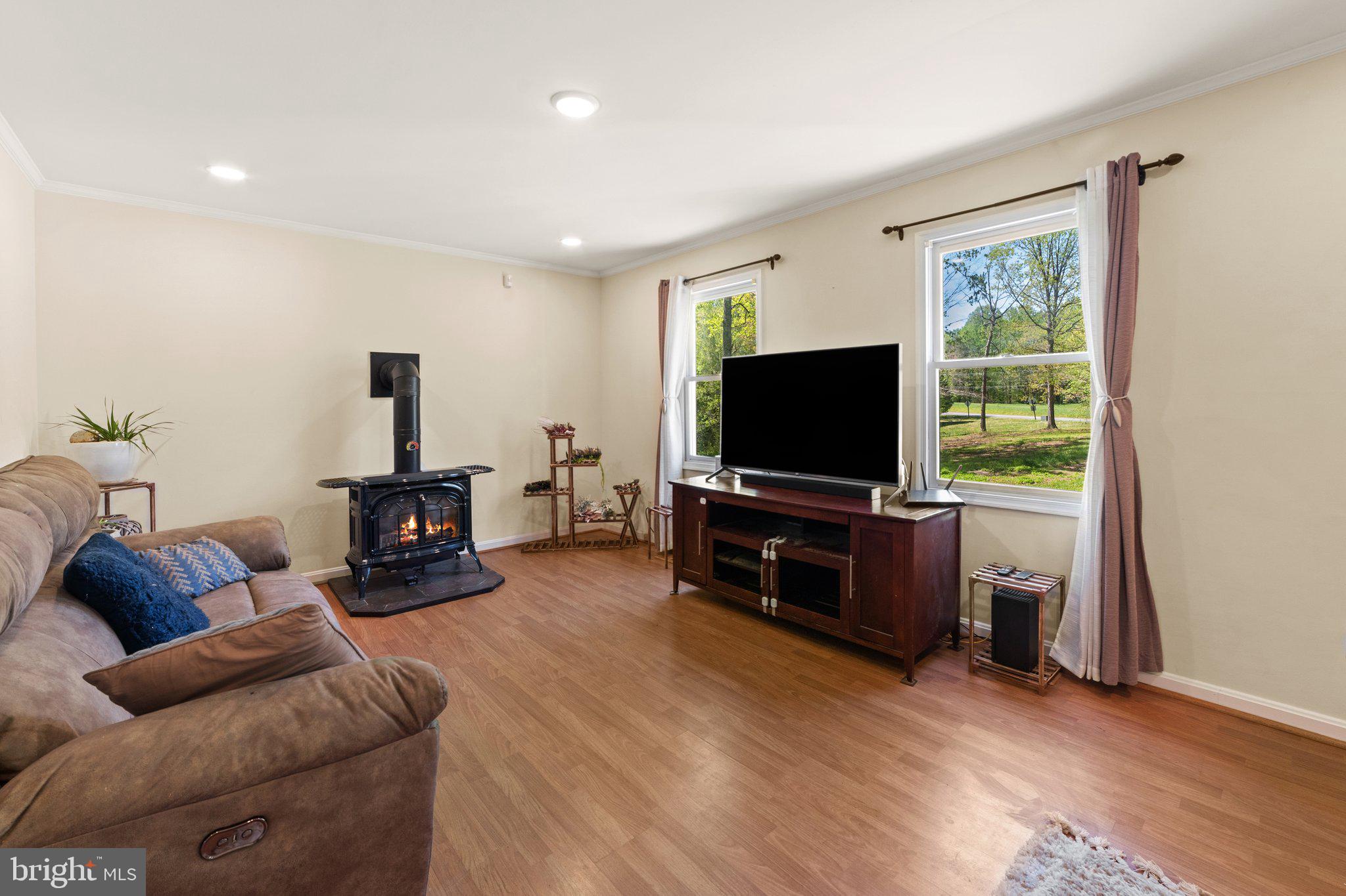 6293 Waterford Road Rixeyville, VA 22737 - Photo 3 of 46 Living Room with Propane Stove