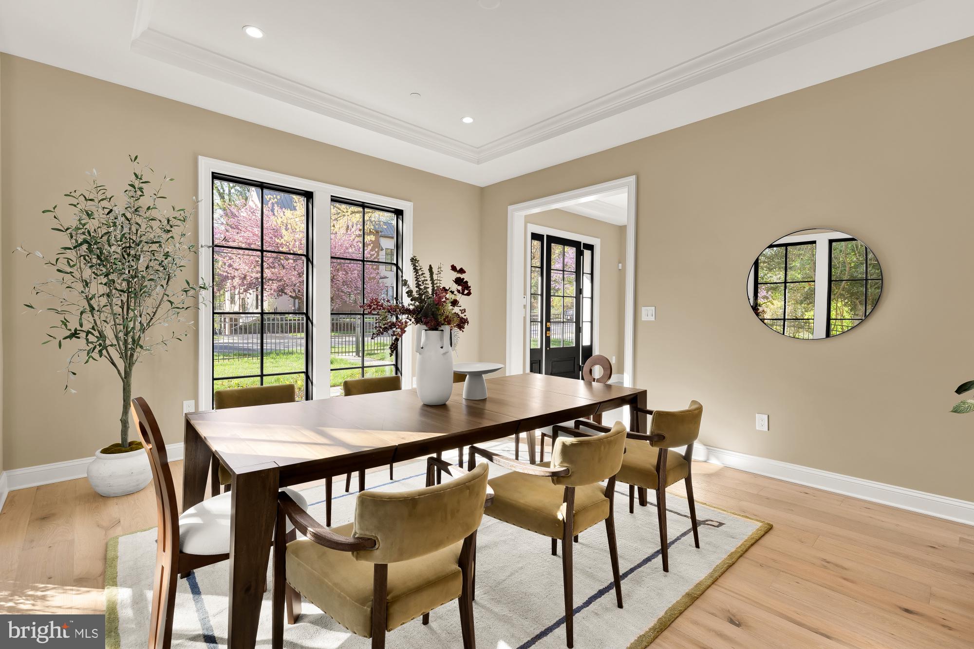 2733 Chesapeake Street Northwest Washington, DC 20008 - Photo 14 of 111 a view of a dining room with furniture window and wooden floor