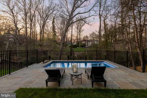 a bathroom with a shower and a toilet