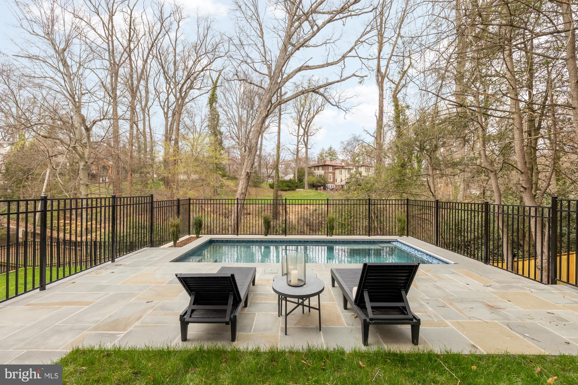 2733 Chesapeake Street Northwest Washington, DC 20008 - Photo 88 of 111 a view of a lake with a bench