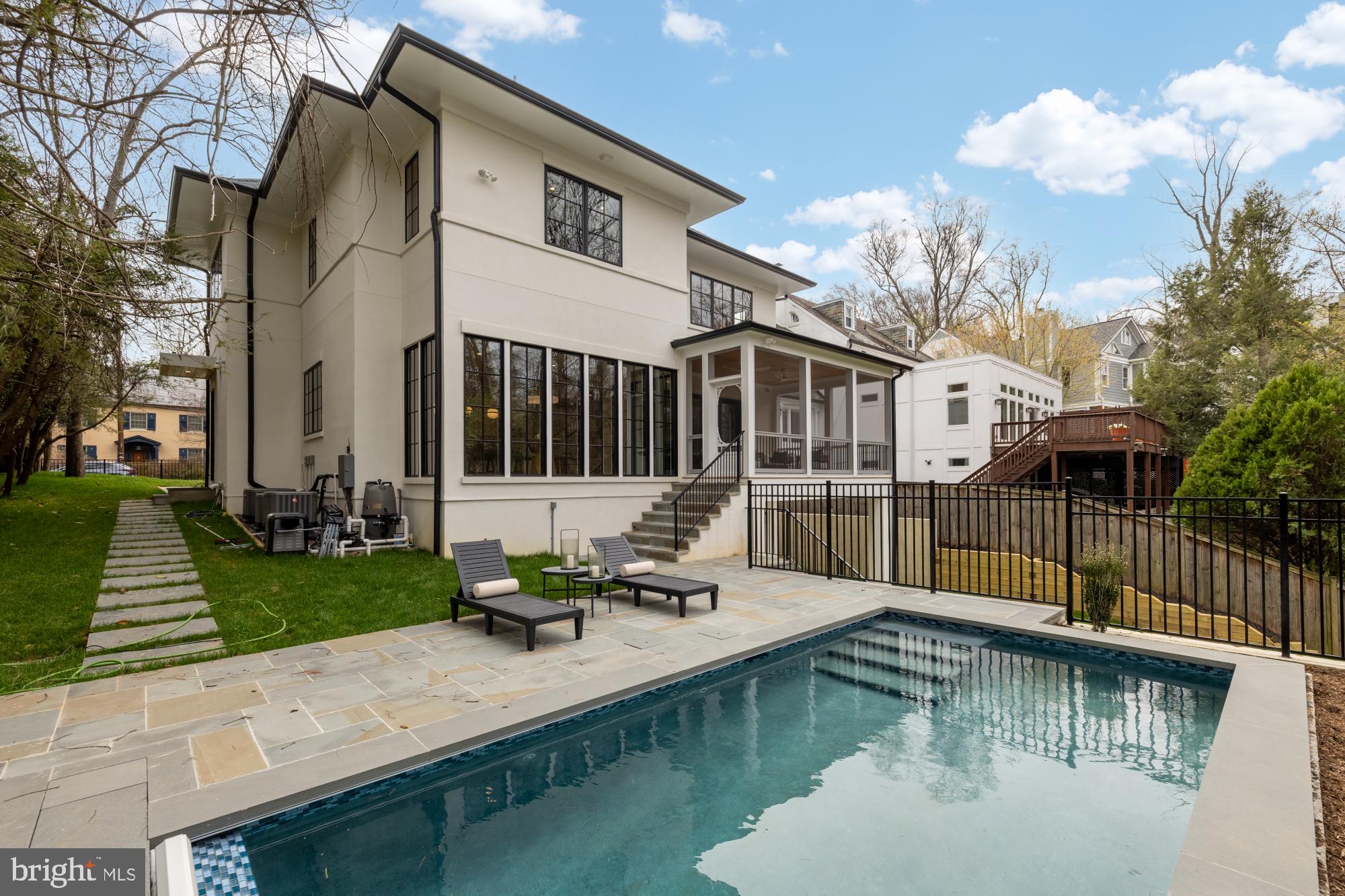 2733 Chesapeake Street Northwest Washington, DC 20008 - Photo 90 of 111 a view of a house with swimming pool in front of it