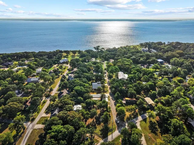 a gym area with water heater and a table