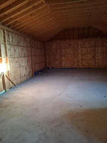a view of a chairs and table in the patio