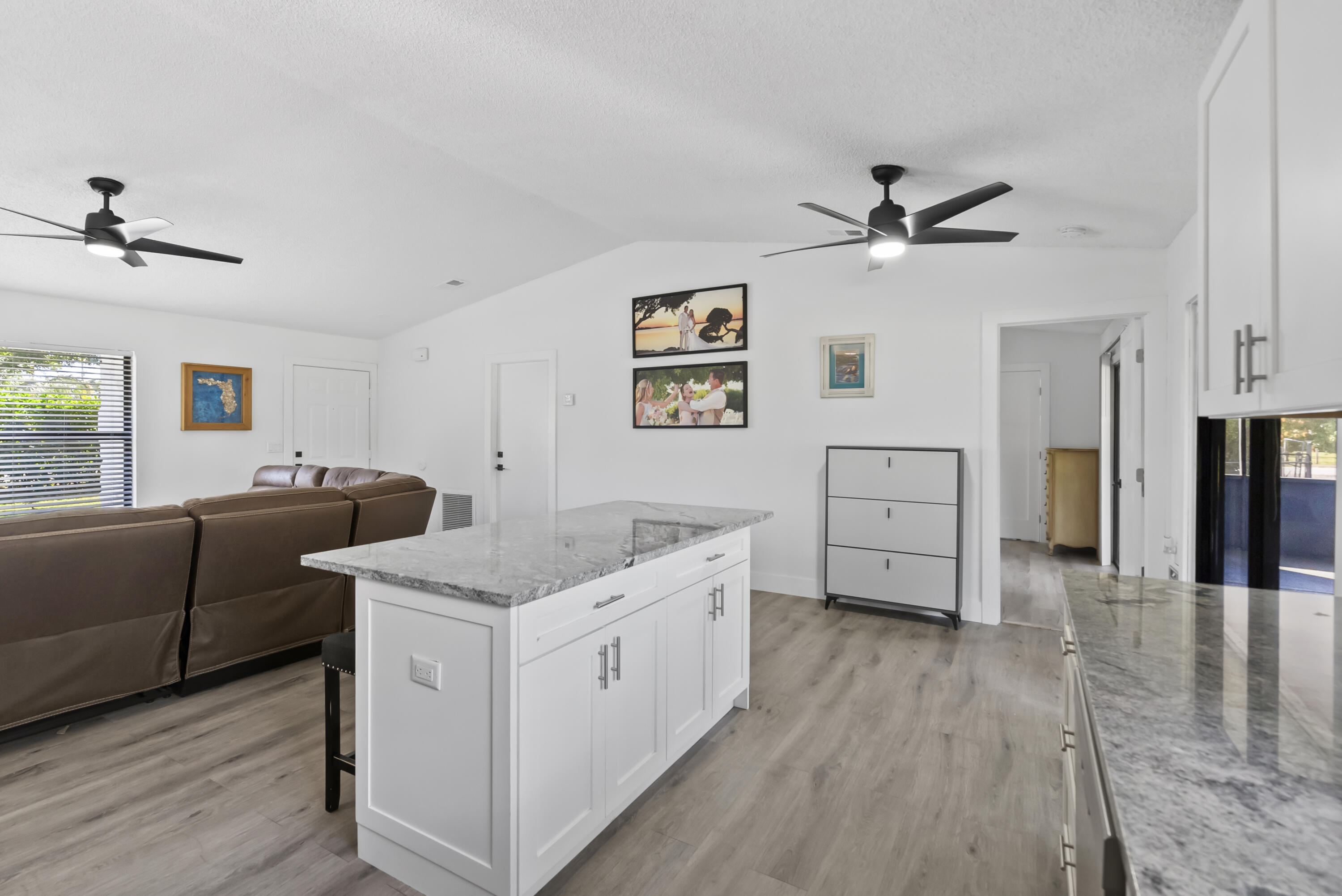 17493 41st Road North The Acreage, FL 33470 - Photo 13 of 45 a living room with furniture and a wooden floor