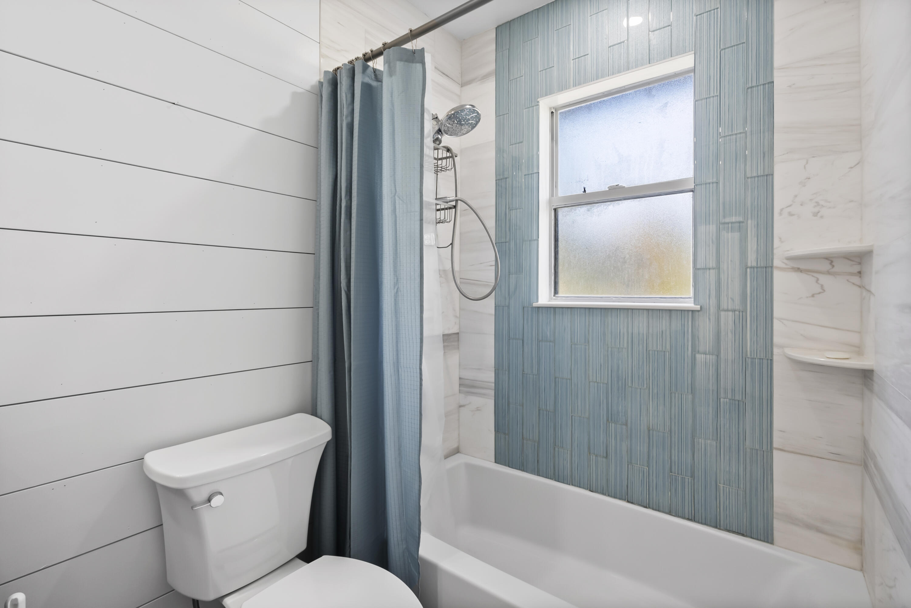 17493 41st Road North The Acreage, FL 33470 - Photo 24 of 45 a bathroom with a toilet and a shower