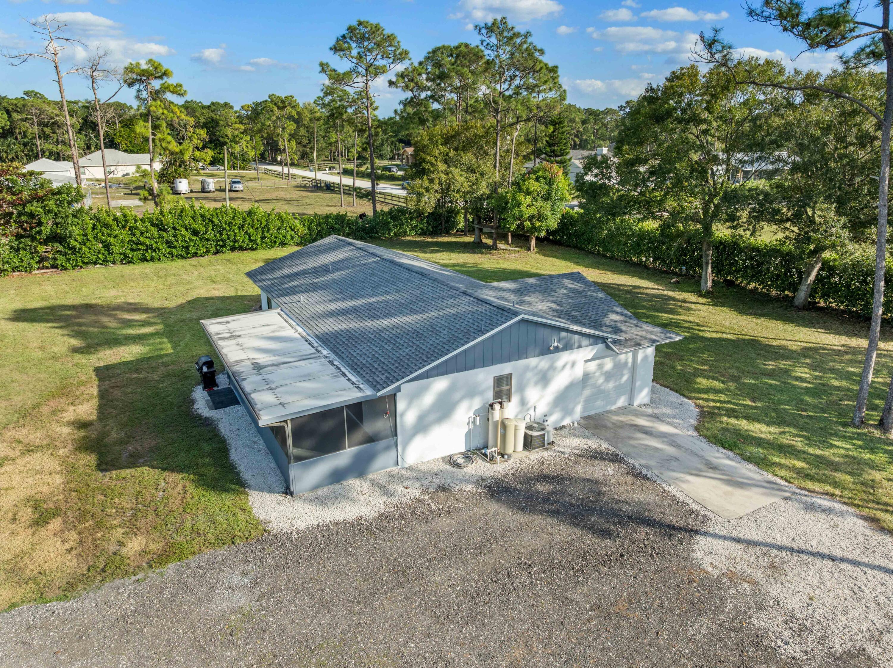 17493 41st Road North The Acreage, FL 33470 - Photo 34 of 45 a view of a wooden deck with a yard