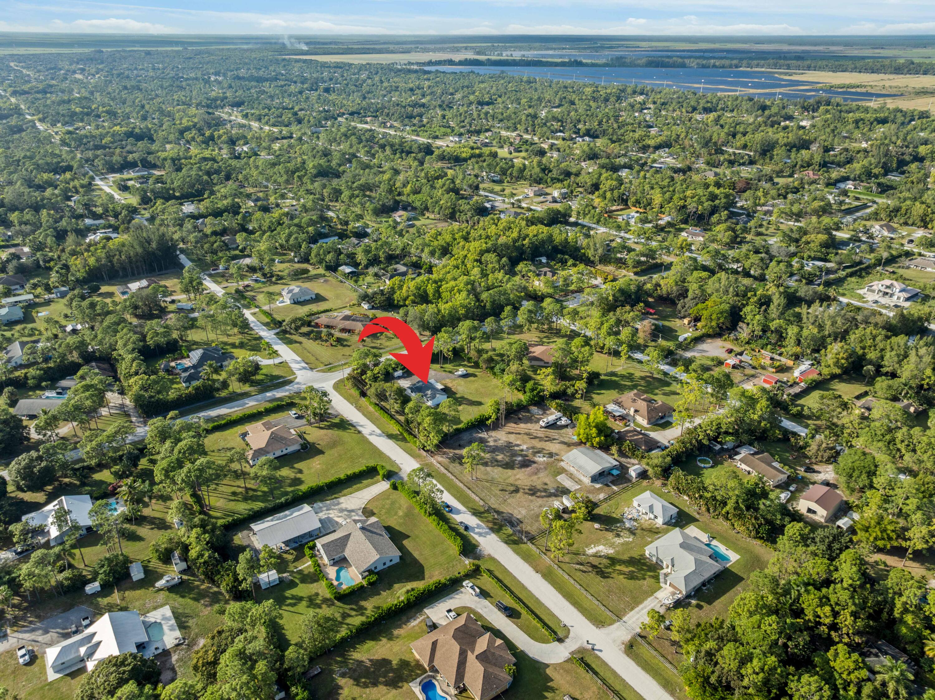 17493 41st Road North The Acreage, FL 33470 - Photo 43 of 45 an aerial view of residential houses with outdoor space