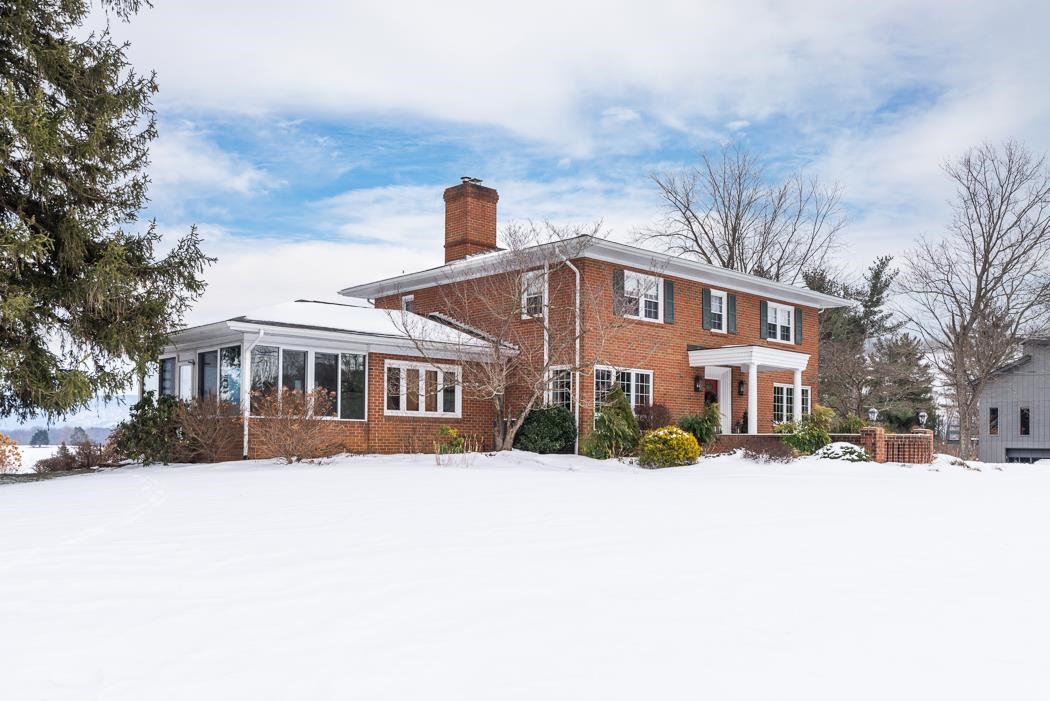205 Cattle Scales Road Waynesboro, VA 22980 - Photo 5 of 75 a front view of a building with a snow