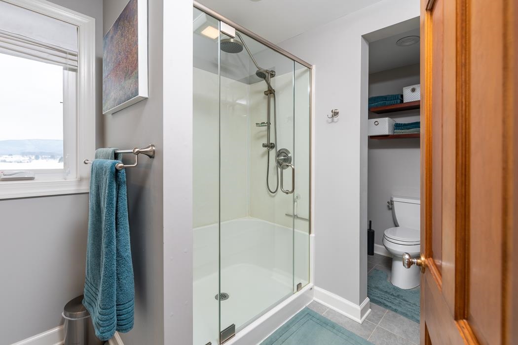 205 Cattle Scales Road Waynesboro, VA 22980 - Photo 53 of 75 a bathroom with a glass shower door