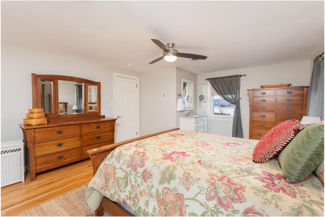 205 Cattle Scales Road Waynesboro, VA 22980 - Photo 57 of 75 a bedroom with a bed and a mirror on dresser