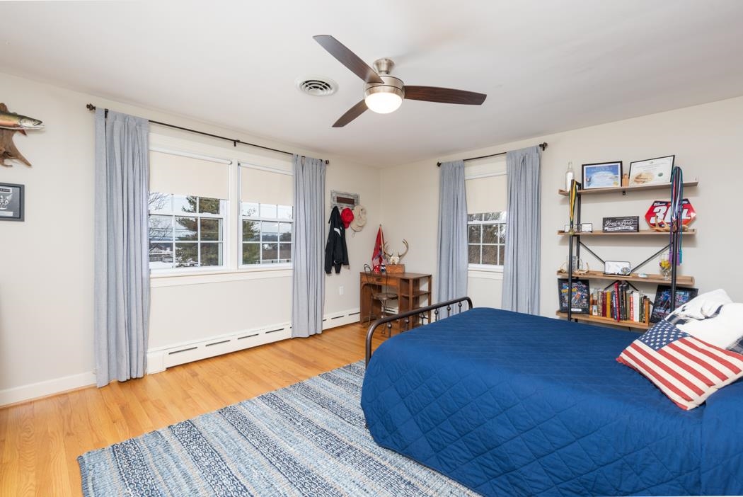 205 Cattle Scales Road Waynesboro, VA 22980 - Photo 59 of 75 a bedroom with furniture and a wooden floor