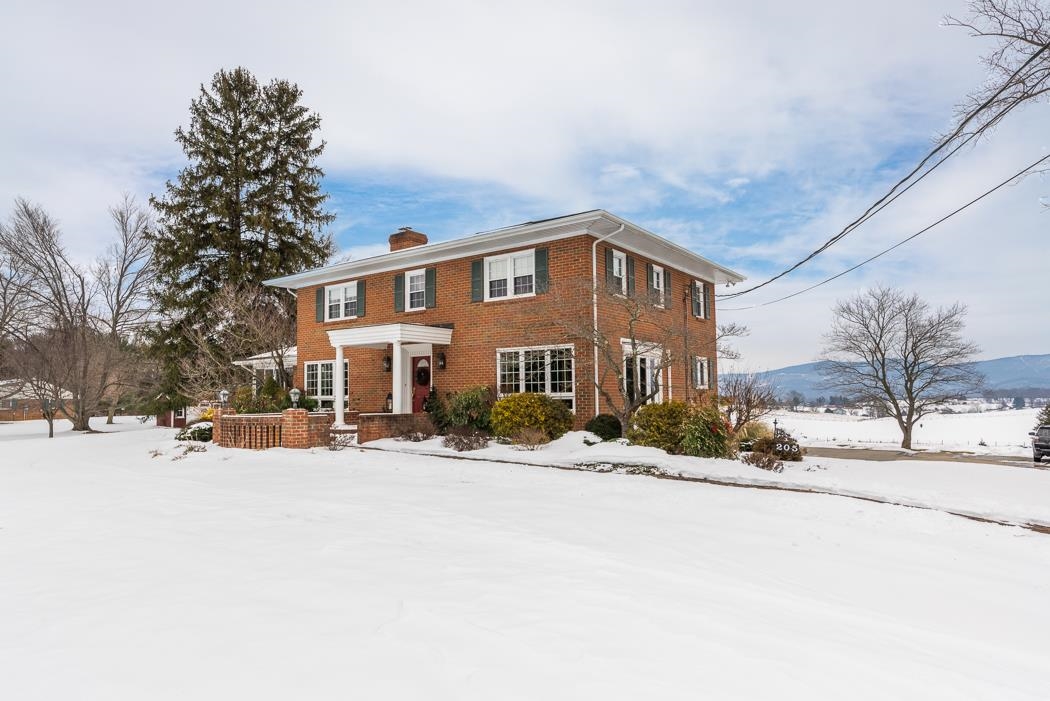 205 Cattle Scales Road Waynesboro, VA 22980 - Photo 6 of 75 a front view of a house with a yard covered in snow