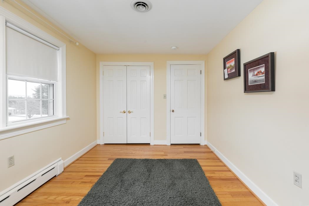 205 Cattle Scales Road Waynesboro, VA 22980 - Photo 61 of 75 a view of an empty room with window and wooden floor