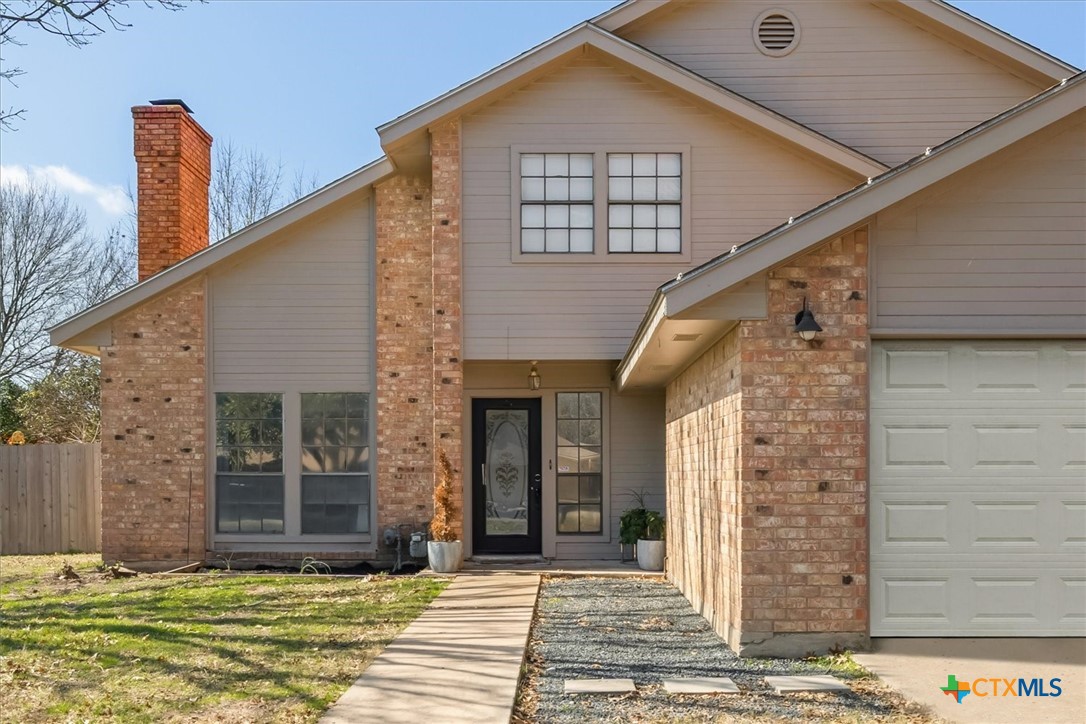 422 Connolly Circle Lockhart, TX 78644 - Photo 1 of 35 a front view of a house with a yard