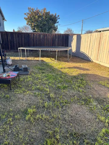 a view of a back yard with a back yard