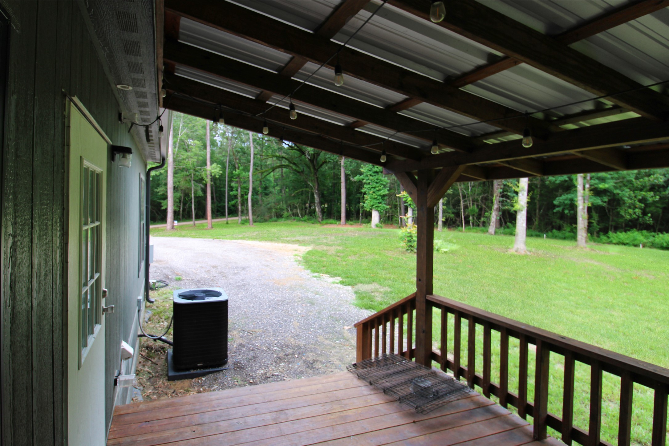 75 Robison Road Coldspring, TX 77331 - Photo 34 of 45 Covered Back Porch