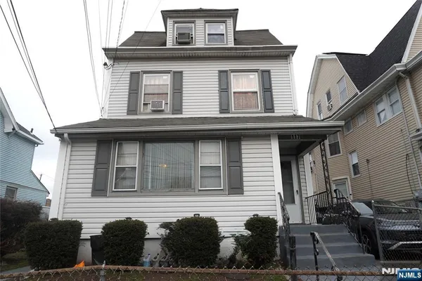 a front view of a house with balcony