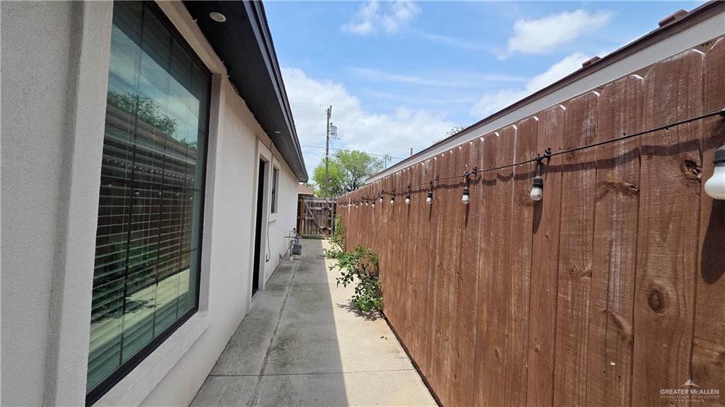419 North 17th Street, Unit 2 McAllen, TX 78501 - Photo 10 of 10 a view of a pathway of a wooden fence