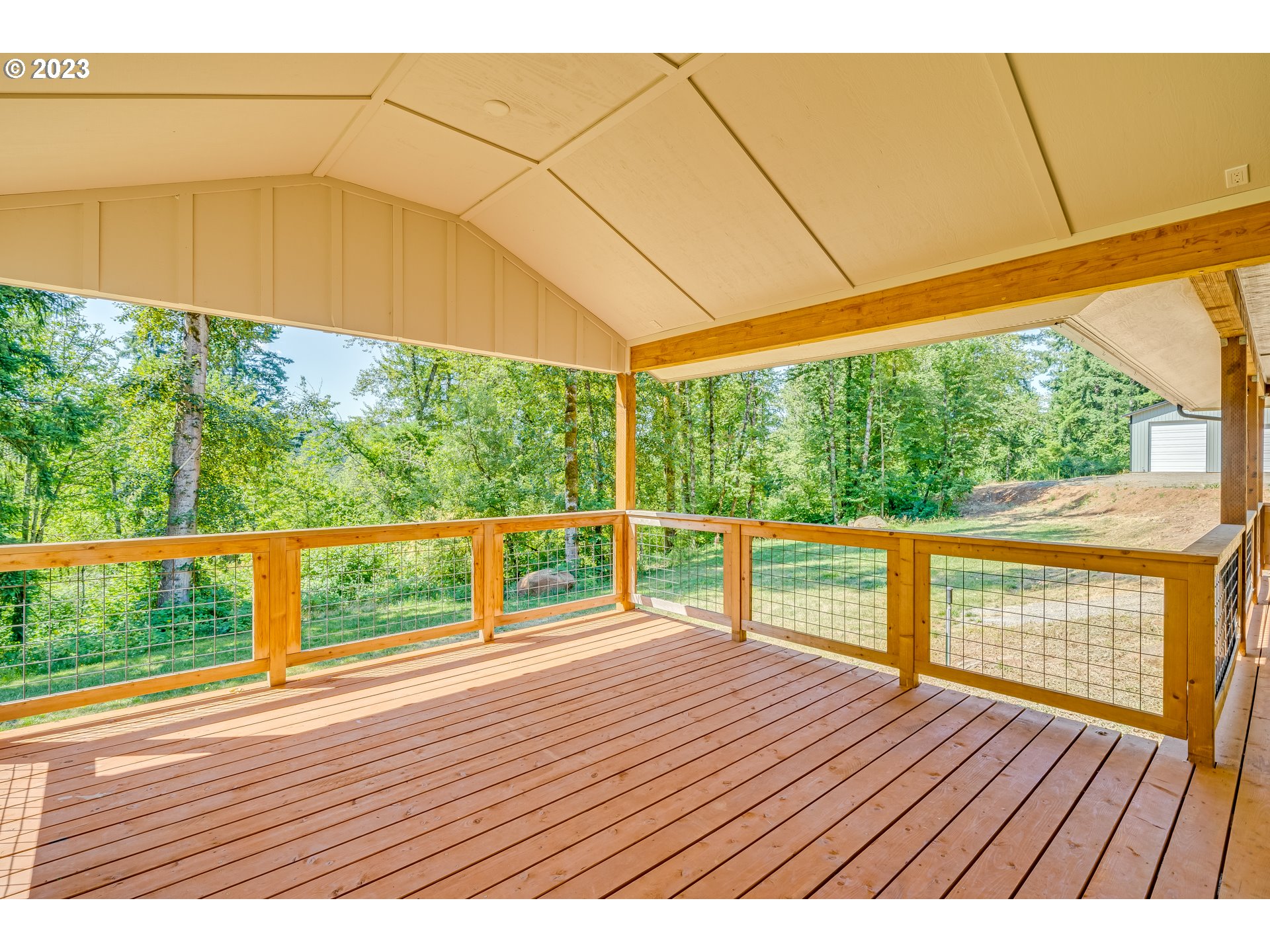 12840 South Carus Road Oregon City, OR 97045 - Photo 14 of 35 a view of balcony with wooden floor