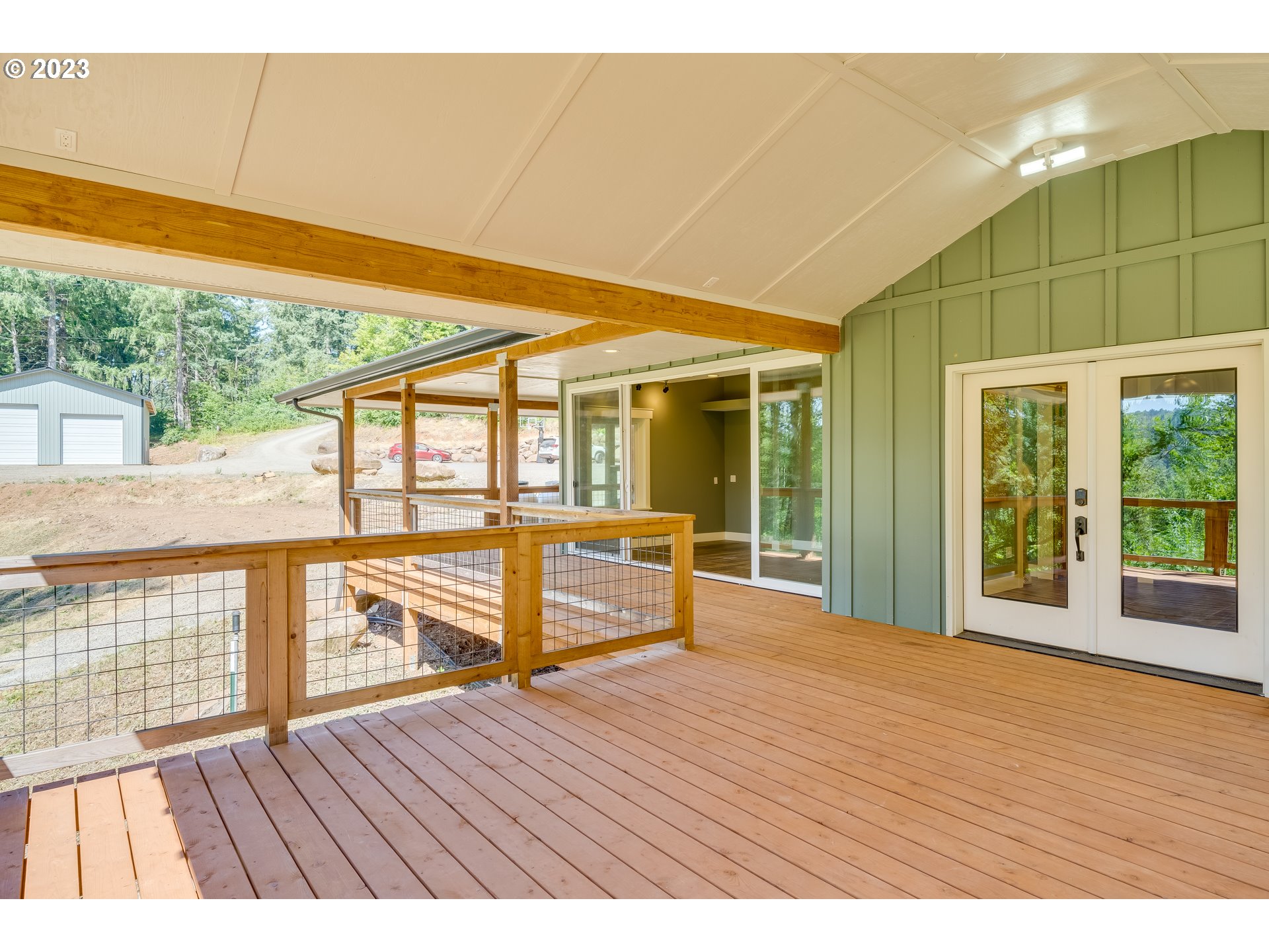 12840 South Carus Road Oregon City, OR 97045 - Photo 33 of 35 a view of an empty room with wooden floor and a window