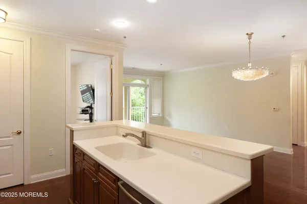 a bathroom with a sink vanity and a mirror