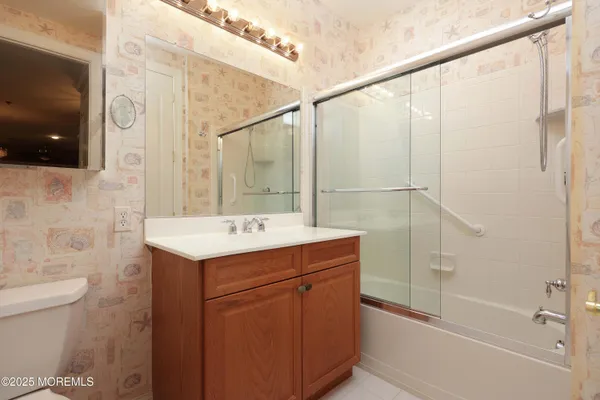 a front view of house and yard with swimming pool and seating