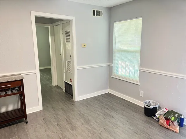a view of livingroom with hardwood and furniture