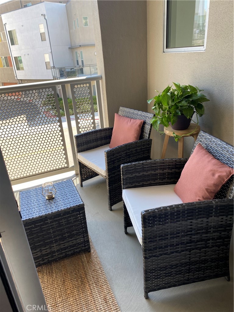 21 Gramercy, Unit 218 Irvine, CA 92612 - Photo 21 of 40 a living room with furniture
