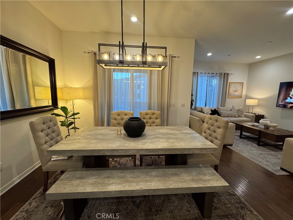 21 Gramercy, Unit 218 Irvine, CA 92612 - Photo 7 of 40 a view of a dining room with furniture