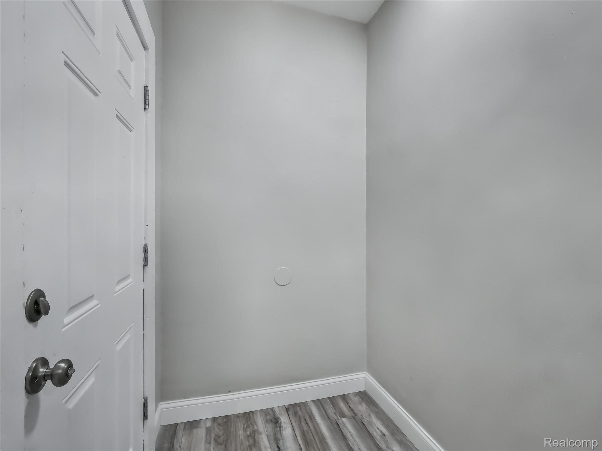 8220 Hudson Avenue Warren, MI 48089 - Photo 3 of 28 Washroom with light wood-style floors and baseboards