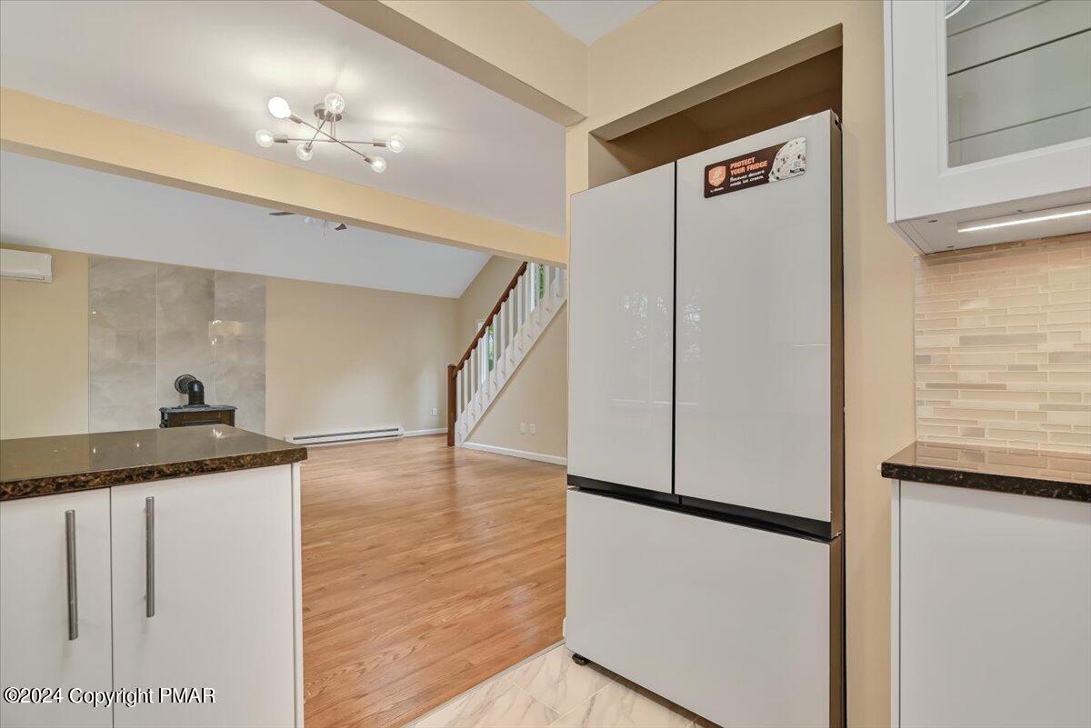 159 Manchester Drive Bushkill, PA 18324 - Photo 18 of 68 a view of a kitchen with a refrigerator and a sink