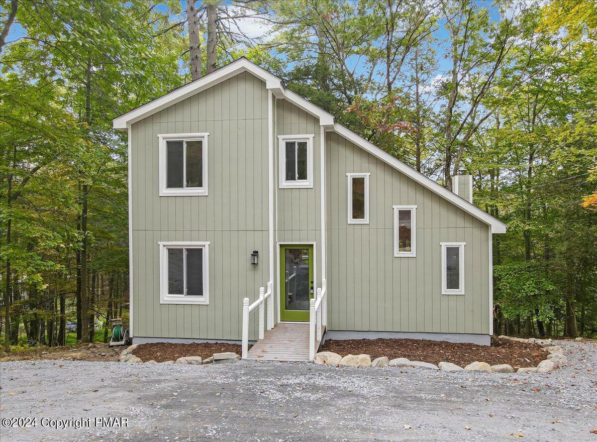 159 Manchester Drive Bushkill, PA 18324 - Photo 2 of 68 a view of a house with a yard