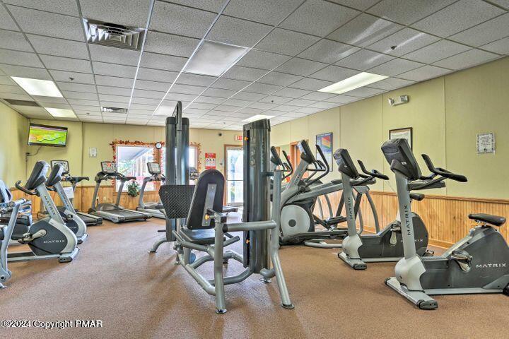 159 Manchester Drive Bushkill, PA 18324 - Photo 56 of 68 a view of a room with gym equipment