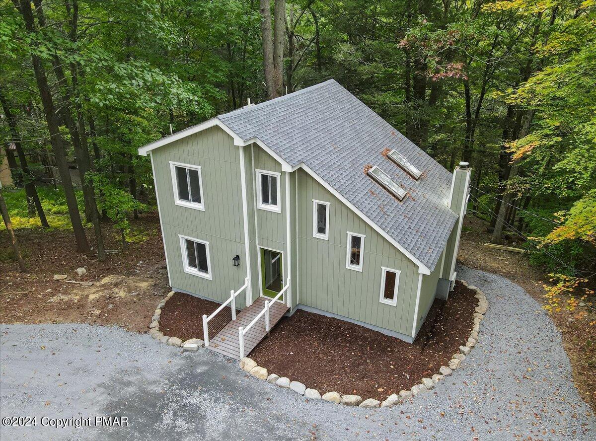 159 Manchester Drive Bushkill, PA 18324 - Photo 6 of 68 a aerial view of a house with a yard