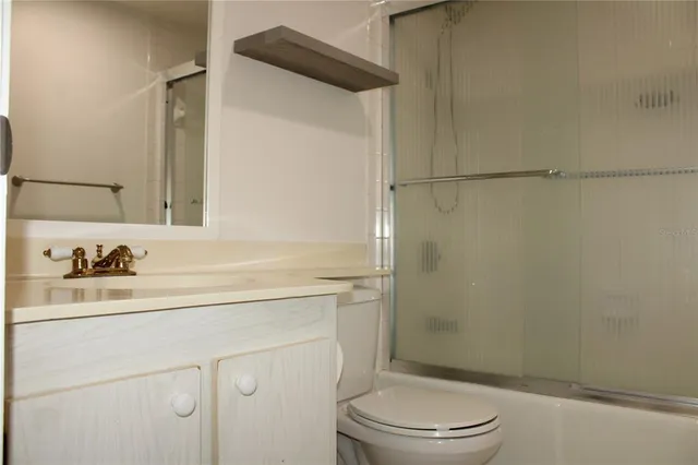 a view of hallway with windows