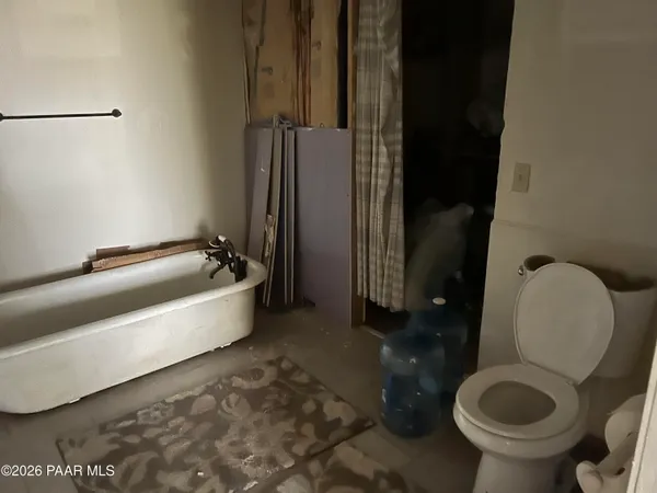 a house with trees in the background