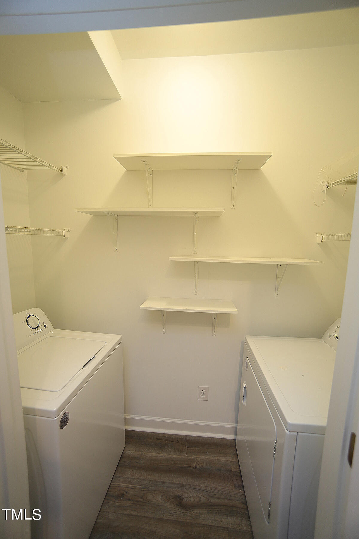 6012 San Marcos Way Raleigh, NC 27616 - Photo 9 of 17 a view of utility room with washer and dryer