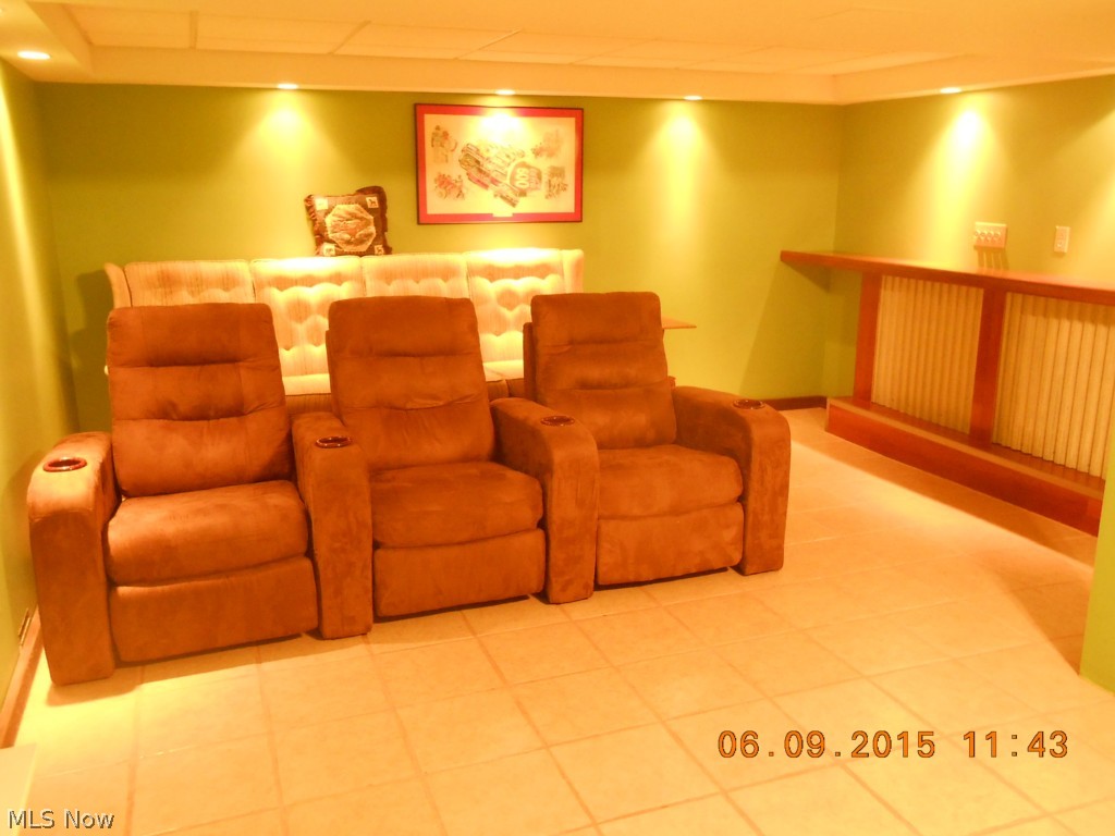 228 Judson Road Kent, OH 44240 - Photo 17 of 25 Media Room to Watch Your Favorite Movies - Features Bar Area, Fireplace and Tile Floor.
