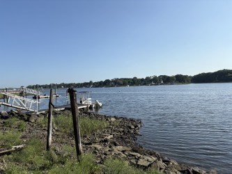 351 County Road Barrington, RI 02806 - Photo 17 of 42 a view of a lake with houses in the back