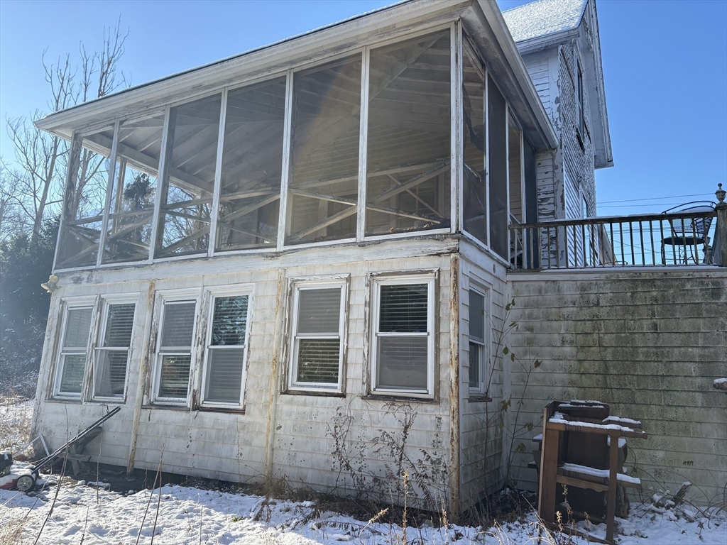 351 County Road Barrington, RI 02806 - Photo 2 of 42 a view of a house with a door and wooden bench