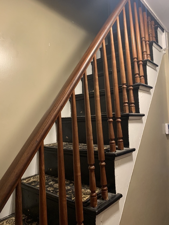 351 County Road Barrington, RI 02806 - Photo 39 of 42 a view of staircase with wooden floor and white walls
