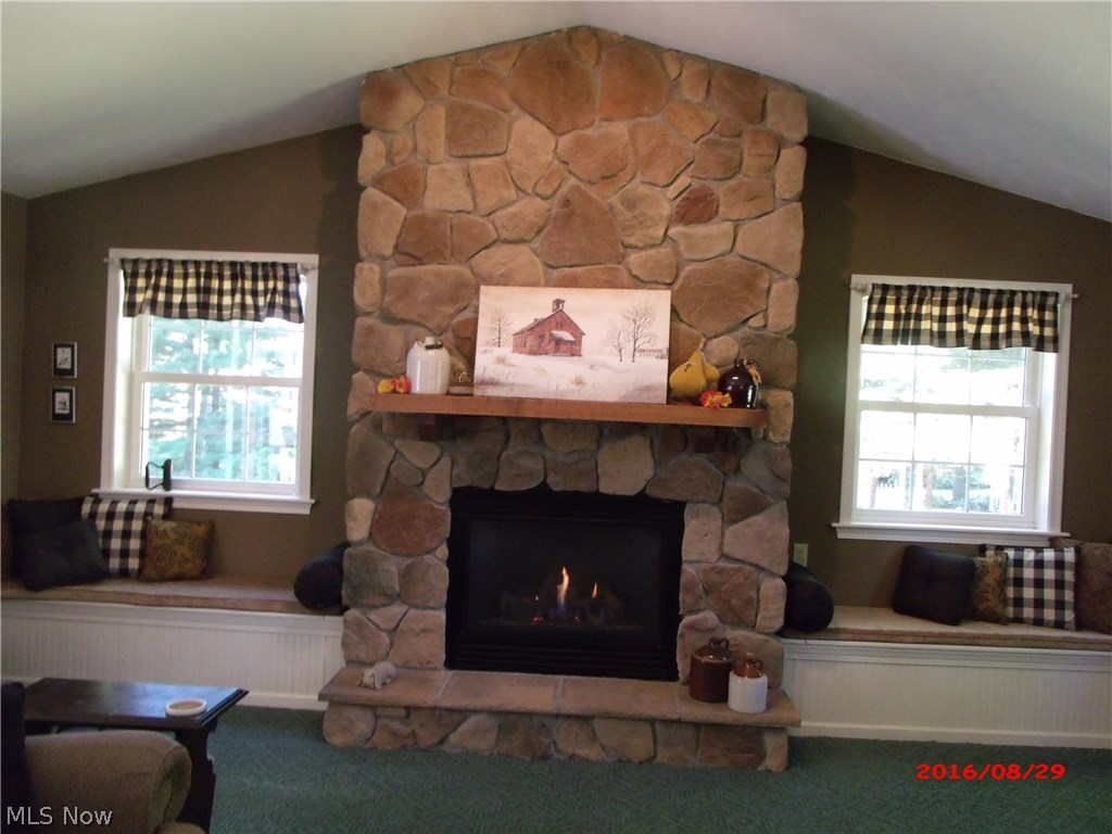 3613 Longfield Road Ravenna, OH 44266 - Photo 7 of 27 Awesome storage area on each side of this gas burning fireplace in the addition on the rear of this home. Which was built with 2x6 exterior walls, which equates a huge savings in cooling and heating.