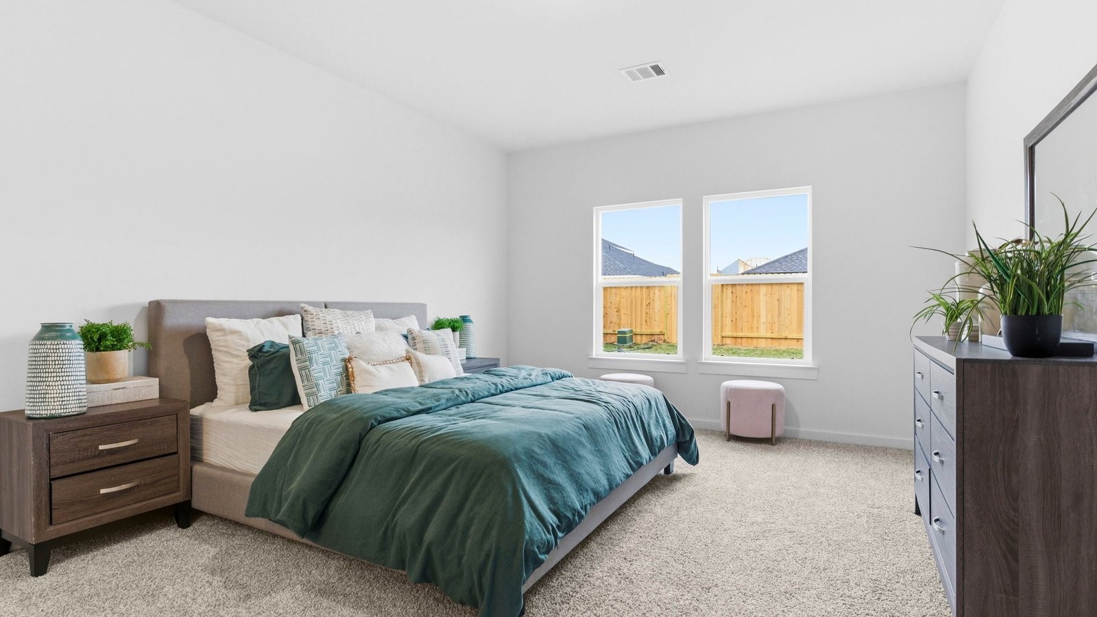 6311 Cherry Mdws Street Rosenberg, TX 77469 - Photo 17 of 43 a bedroom with a bed and a window
