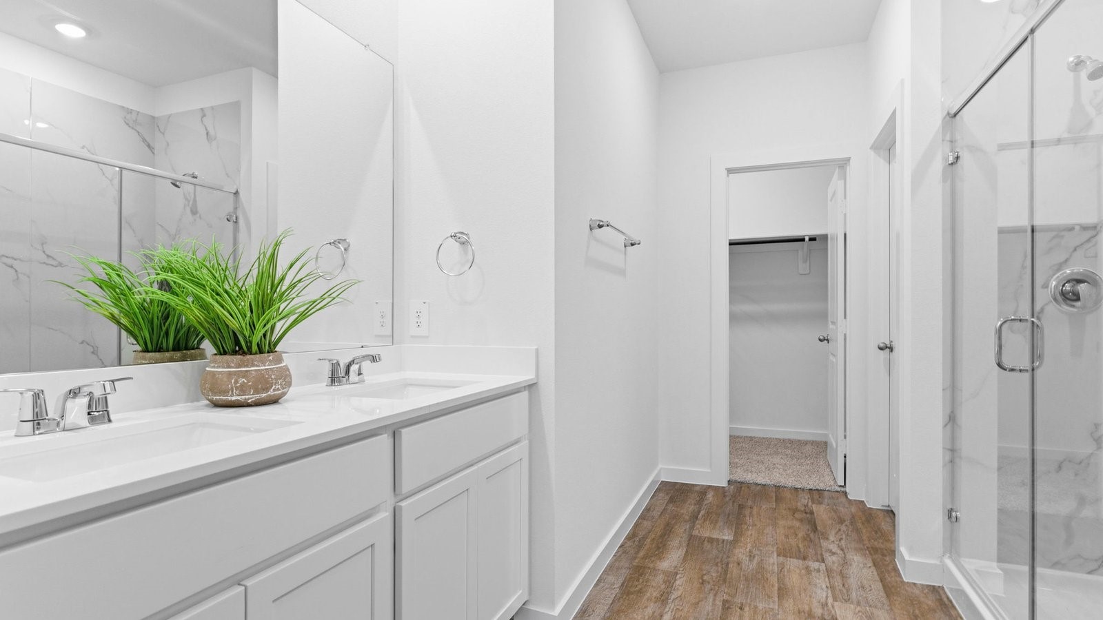 6311 Cherry Mdws Street Rosenberg, TX 77469 - Photo 19 of 43 a bathroom with a shower sink vanity and a mirror