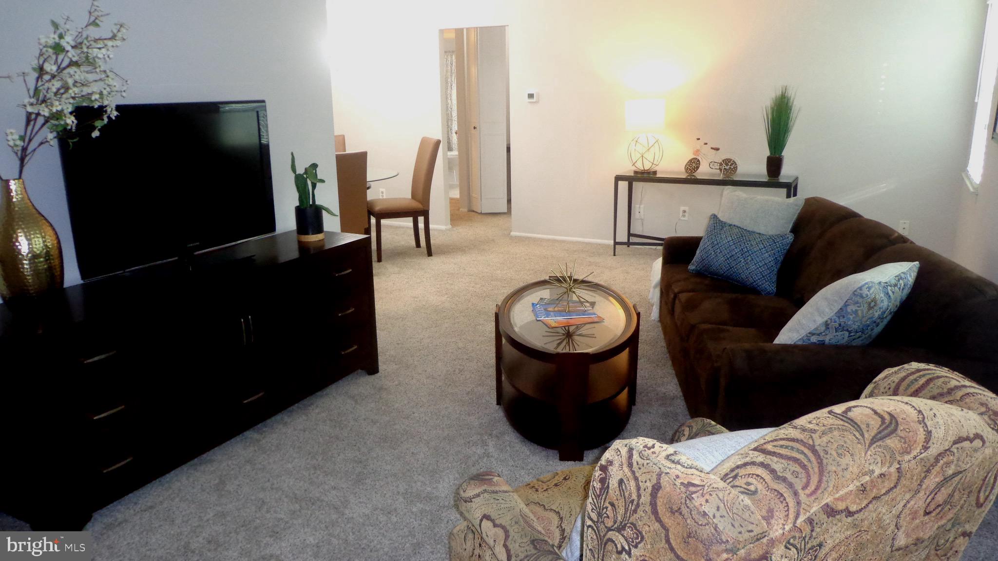 58 Old Forge Crossing Devon, PA 19333 - Photo 12 of 15 Living room view to dining area