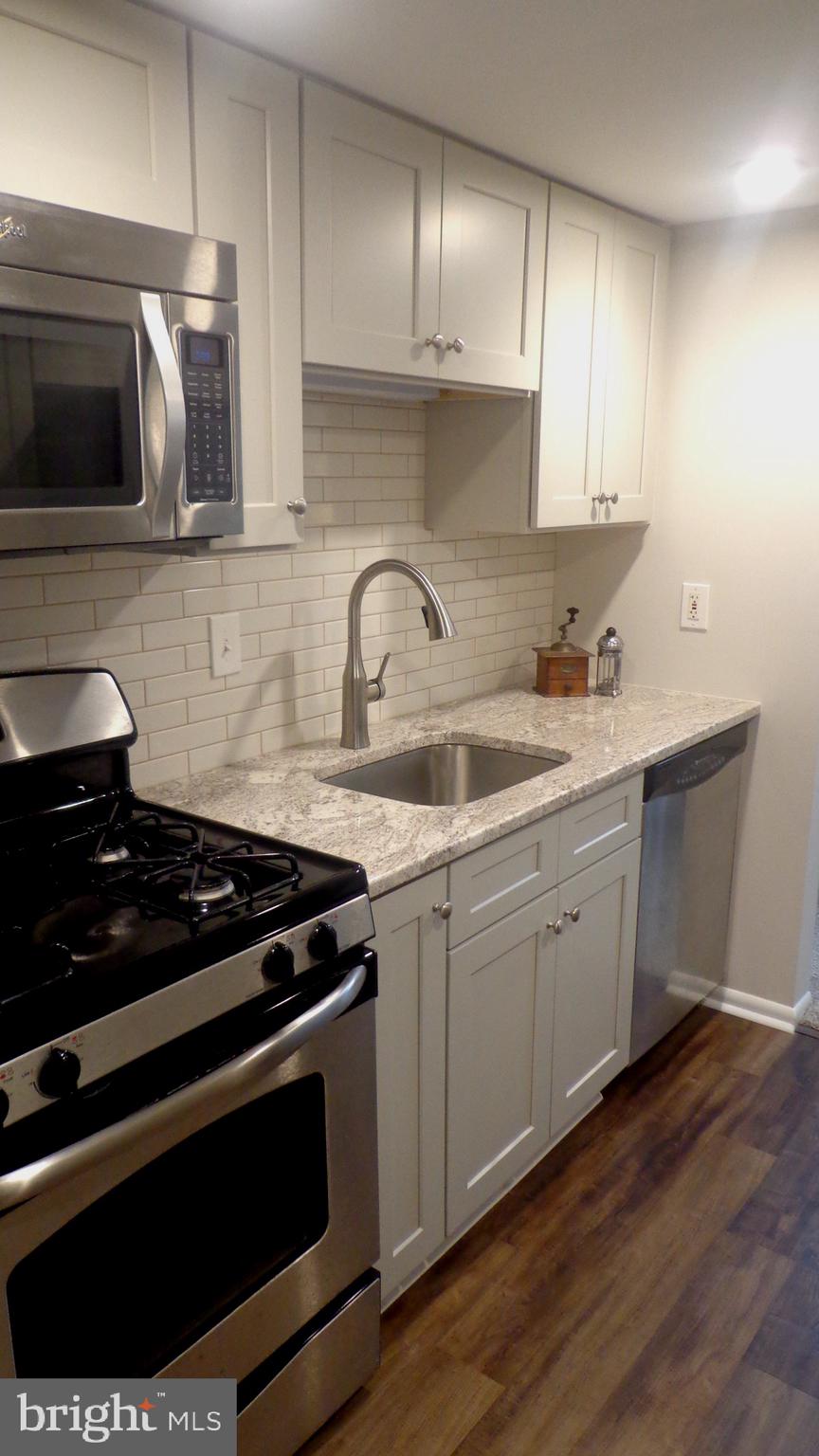 58 Old Forge Crossing Devon, PA 19333 - Photo 6 of 15 Gas cooking and built in microwave