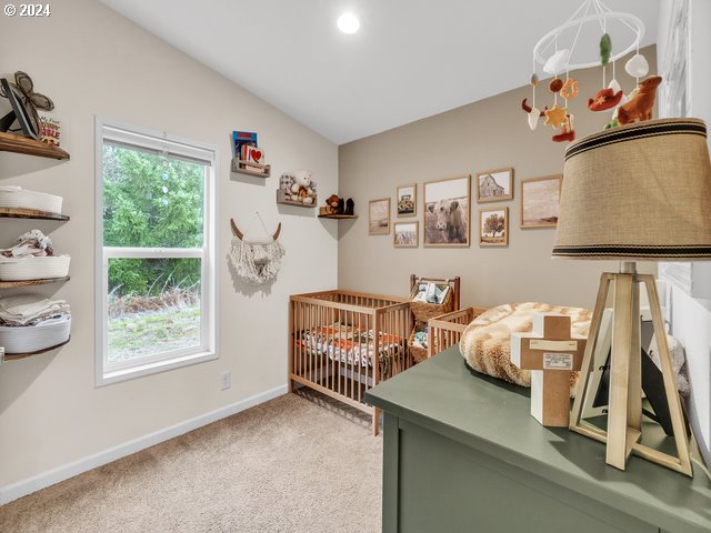 22575 Business 18 Willamina, OR 97396 - Photo 13 of 24 a bedroom with furniture and a window