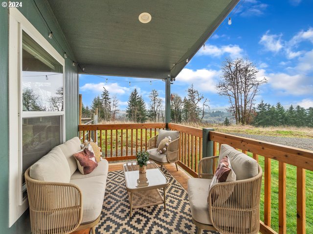 22575 Business 18 Willamina, OR 97396 - Photo 14 of 24 a balcony with wooden floor